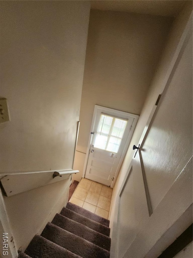 3409 Saint Gregory Ln, Saint Ann, MO 63074 - stairs with tile patterned floors