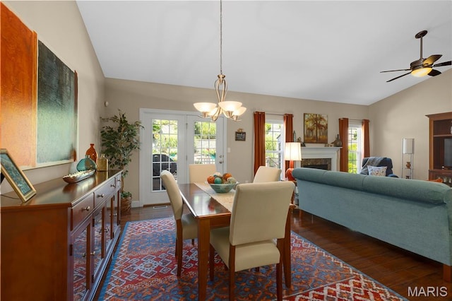 341 Brunhaven Ct, Chesterfield, MO 63017 - dining area featuring vaulted ceiling, dark wood-style floors, a ceiling fan, and a fireplace