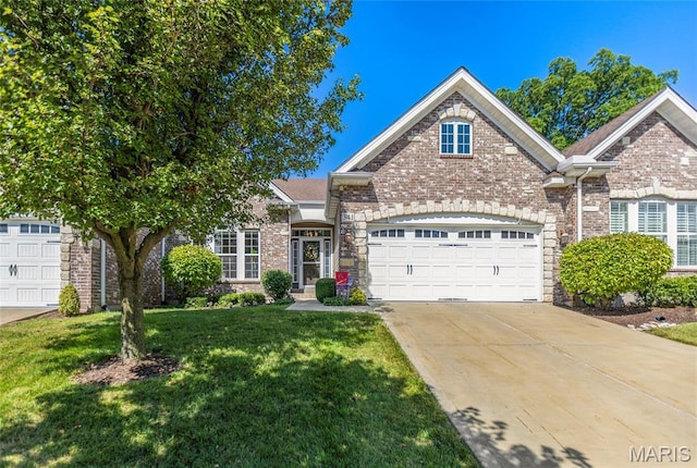 341 Brunhaven Ct, Chesterfield, MO 63017 - traditional-style home with concrete driveway, a front yard, an attached garage, and brick siding
