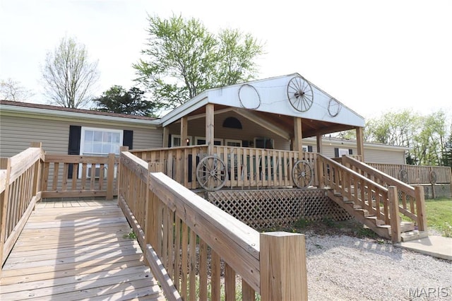 wooden terrace featuring a porch
