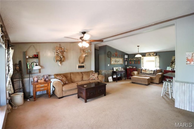 living area with carpet flooring and ceiling fan