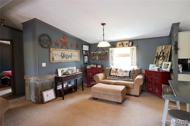 carpeted living room featuring vaulted ceiling