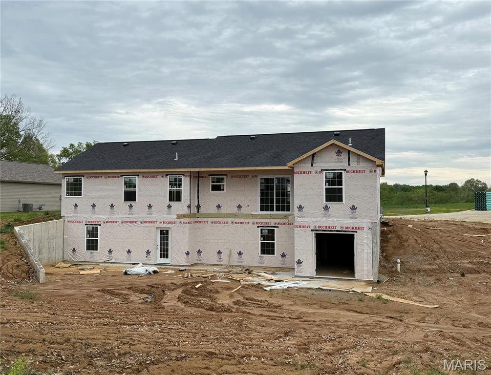 11 Bluebell Way, Jackson, MO 63755 - back of house featuring roof with shingles