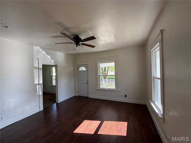 1014 E Broadway, Centralia, IL 62801 - foyer entrance featuring wood finished floors, ceiling fan, and baseboards