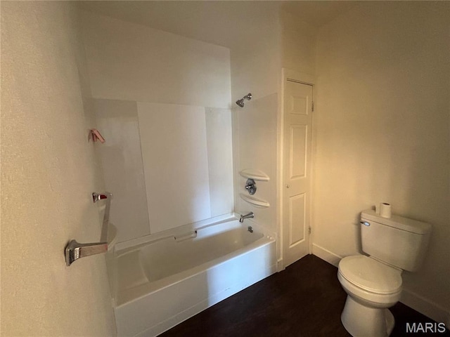 1014 E Broadway, Centralia, IL 62801 - full bath with toilet, shower / bath combination, and baseboards