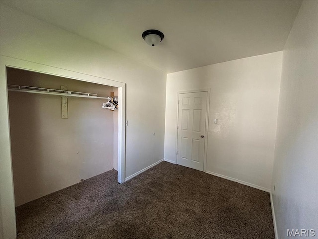 1014 E Broadway, Centralia, IL 62801 - unfurnished bedroom featuring carpet floors and a closet