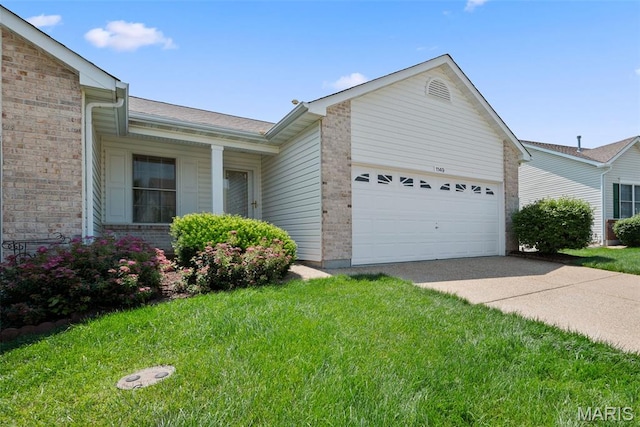1149 Silo Bnd Unit 341A, Wentzville, MO 63385 - ranch-style home featuring a garage, brick siding, driveway, and a front yard