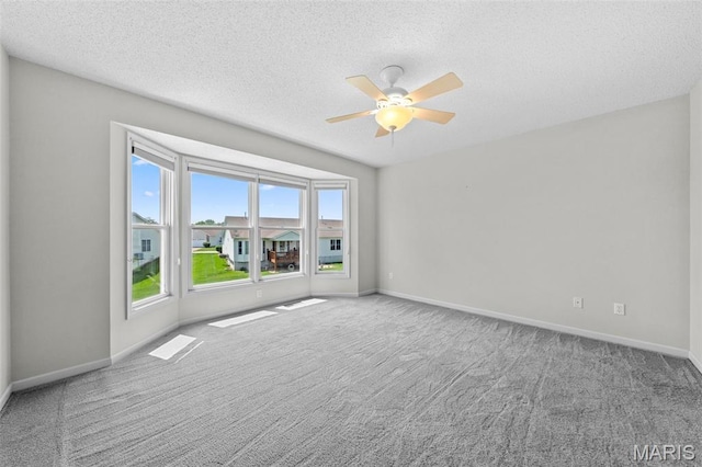 1149 Silo Bnd Unit 341A, Wentzville, MO 63385 - carpeted spare room featuring ceiling fan and a textured ceiling