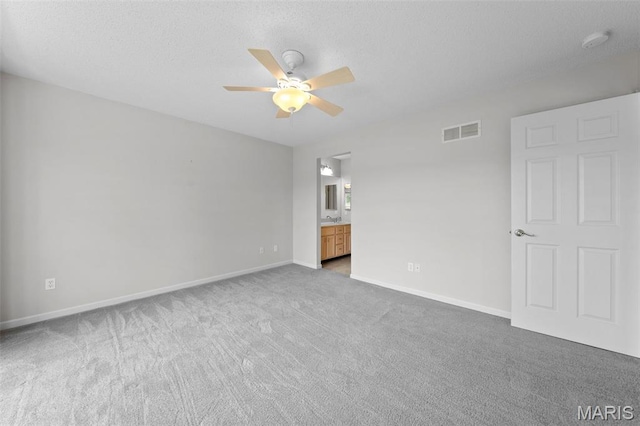 1149 Silo Bnd Unit 341A, Wentzville, MO 63385 - carpeted empty room with ceiling fan, a smoke detector, and a textured ceiling
