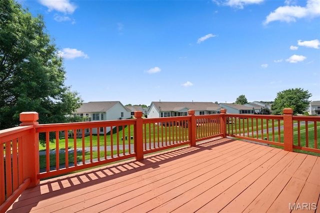 1149 Silo Bnd Unit 341A, Wentzville, MO 63385 - wooden deck featuring a residential view and a lawn