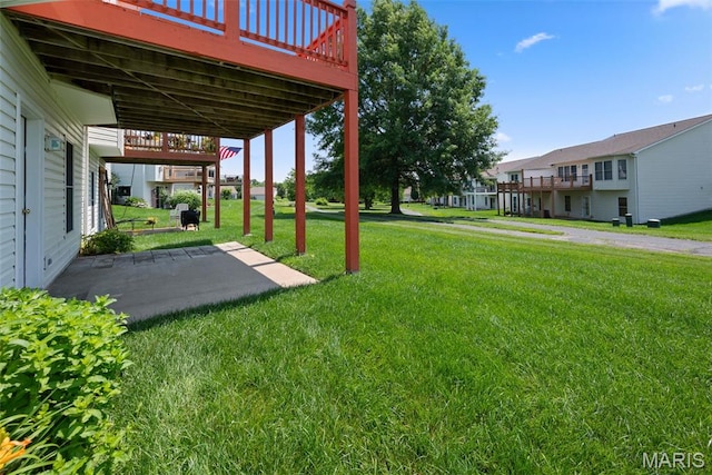 1149 Silo Bnd Unit 341A, Wentzville, MO 63385 - view of grassy yard with a deck, a residential view, and a patio