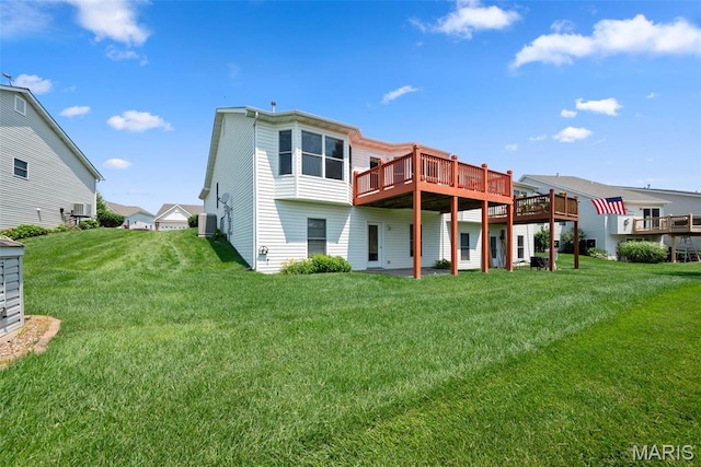 1149 Silo Bnd Unit 341A, Wentzville, MO 63385 - back of property featuring a deck and a lawn