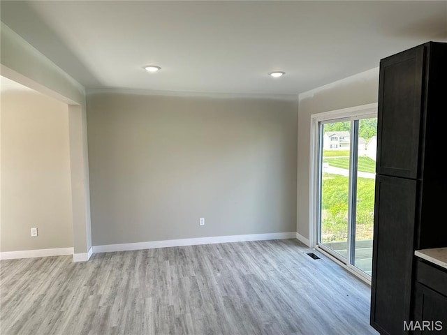 204 Pacific Ave, Union, MO 63084 - spare room featuring light wood-style flooring, baseboards, and recessed lighting