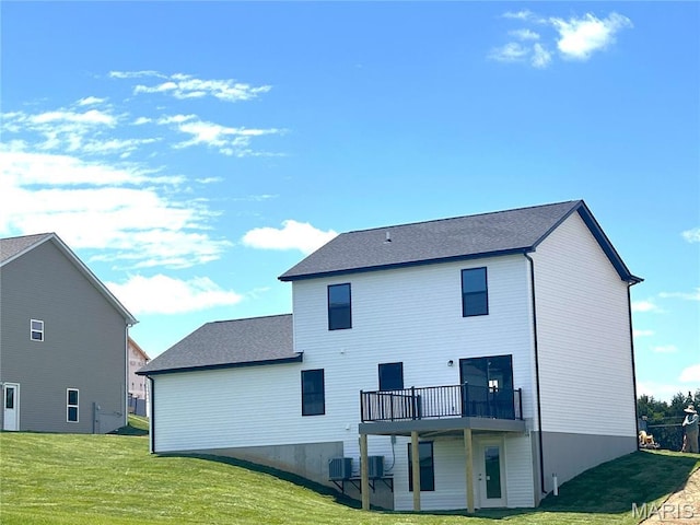 204 Pacific Ave, Union, MO 63084 - back of property with a lawn, a deck, and central air condition unit