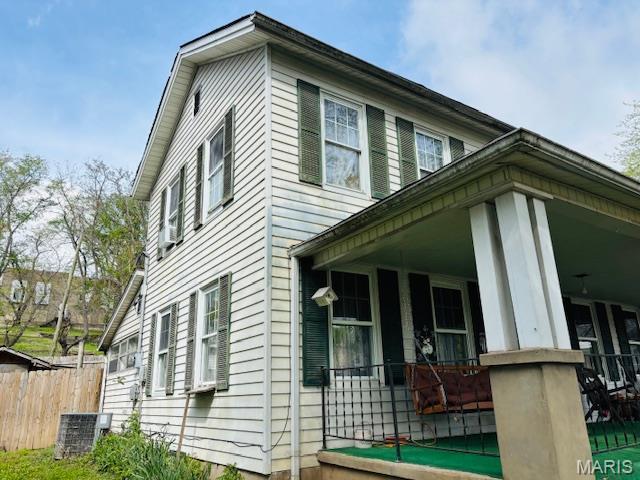 206 1st St, Steelville, MO 65565 - view of side of property featuring a porch and central AC unit