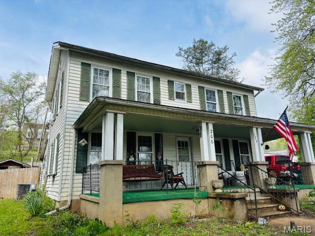 206 1st St, Steelville, MO 65565 - view of front of property featuring a porch and central AC