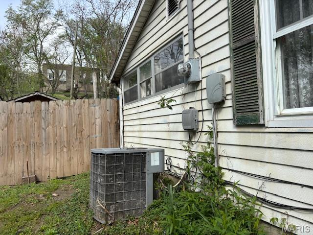 206 1st St, Steelville, MO 65565 - exterior view of central air condition unit and electric meter