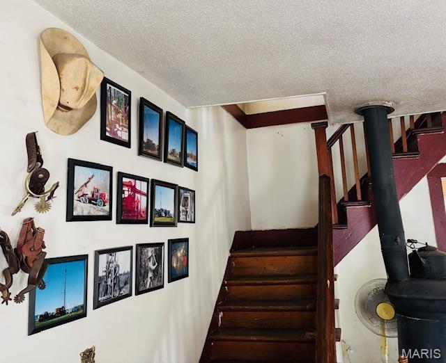 206 1st St, Steelville, MO 65565 - staircase with a textured ceiling