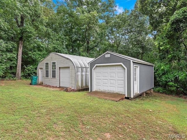 3870 Wilkinson Rd, De Soto, MO 63020 - detached garage with view of wooded area