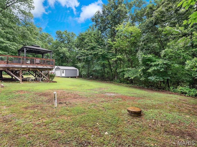 3870 Wilkinson Rd, De Soto, MO 63020 - view of green lawn featuring a gazebo, a storage shed, and a deck