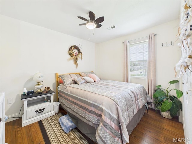 462 Harrison St, Lebanon, MO 65536 - bedroom featuring wood finished floors, ceiling fan, and baseboards