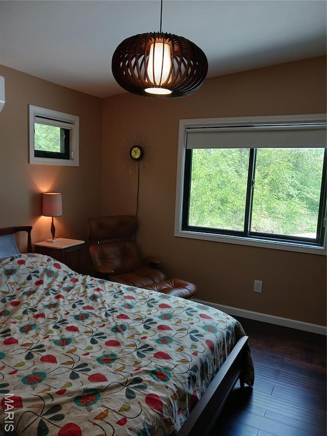 205 Lake Dr, Gray Summit, MO 63039 - bedroom with multiple windows, baseboards, and wood finished floors