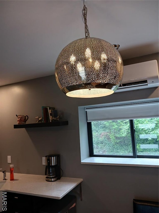 205 Lake Dr, Gray Summit, MO 63039 - detailed view of an AC wall unit and a chandelier