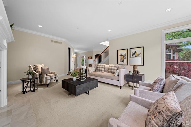living room with baseboards, recessed lighting, crown molding, and stairs
