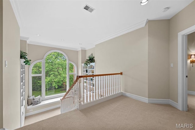 hallway featuring carpet floors, crown molding, baseboards, an upstairs landing, and recessed lighting