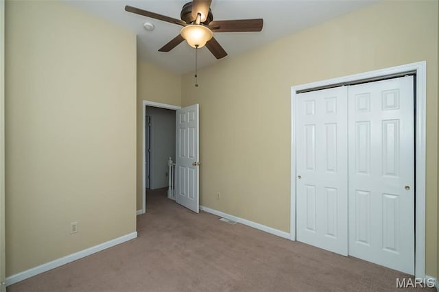 1003 Allen Ave, Saint Louis, MO 63104 - unfurnished bedroom with carpet flooring, a closet, baseboards, a ceiling fan, and lofted ceiling