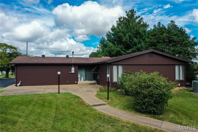 1500 Gravois Rd, High Ridge, MO 63049 - ranch-style home with a front lawn and central air condition unit