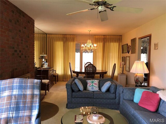 1500 Gravois Rd, High Ridge, MO 63049 - carpeted living area featuring a chandelier and ceiling fan