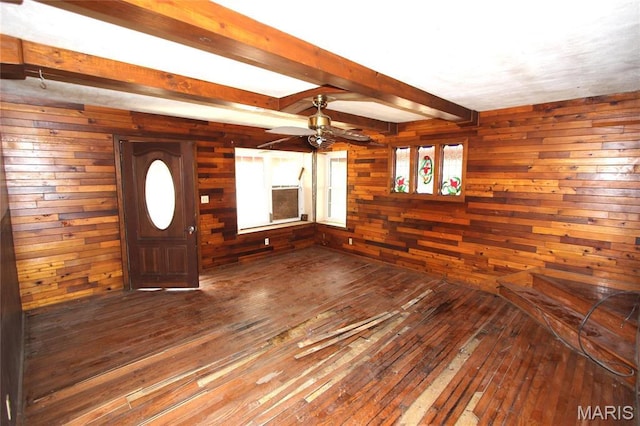 9434 Joan Ct, Bonne Terre, MO 63628 - entrance foyer featuring wood-type flooring, beam ceiling, wooden walls, and ceiling fan