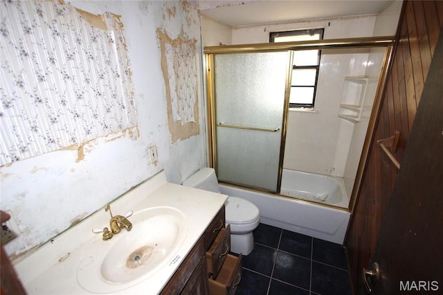 9434 Joan Ct, Bonne Terre, MO 63628 - full bath featuring toilet, tile patterned floors, combined bath / shower with glass door, and vanity