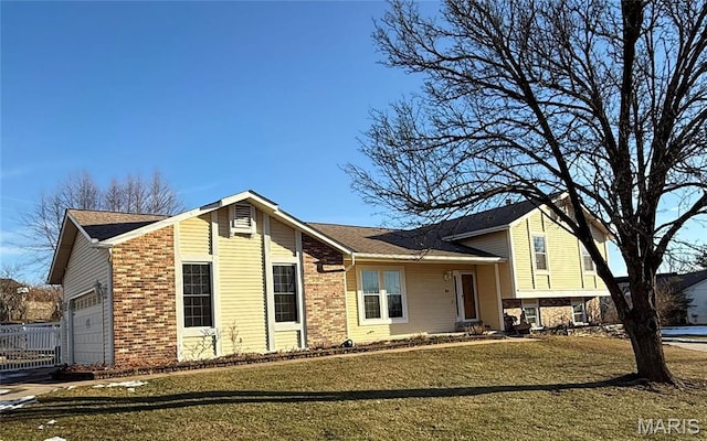24 Shaw Ct, Cottleville Township, MO 63304 - split level home featuring brick siding and a front lawn