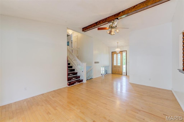 24 Shaw Ct, Cottleville Township, MO 63304 - unfurnished living room featuring light wood-style flooring, ceiling fan, stairs, and baseboards