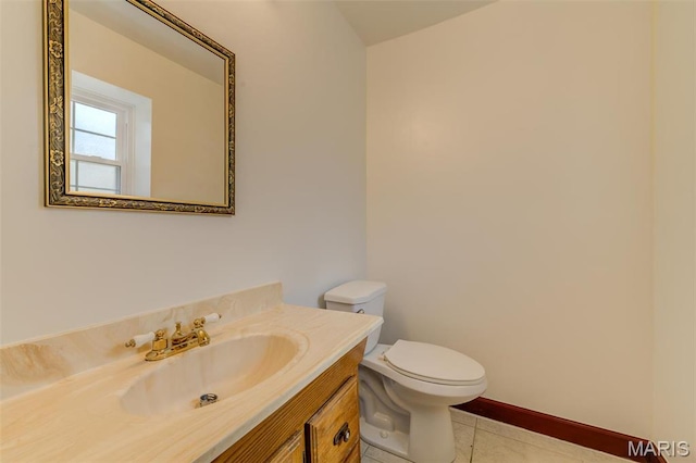 24 Shaw Ct, Cottleville Township, MO 63304 - half bath featuring tile patterned flooring, toilet, vanity, and baseboards