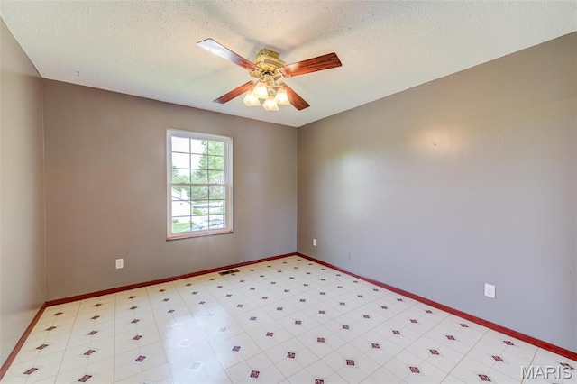 24 Shaw Ct, Cottleville Township, MO 63304 - unfurnished room with a ceiling fan, a textured ceiling, baseboards, and light flooring