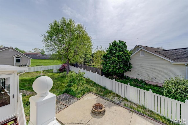 24 Shaw Ct, Cottleville Township, MO 63304 - view of yard featuring a fire pit and a patio area
