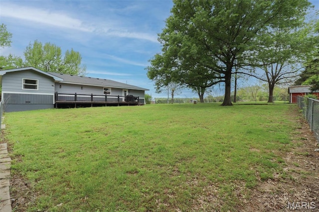 view of yard with a deck
