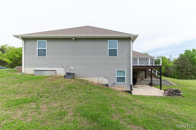 5814 Calvey Creek Rd, Robertsville, MO 63072 - back of property featuring stairway, a patio, a yard, and a wooden deck
