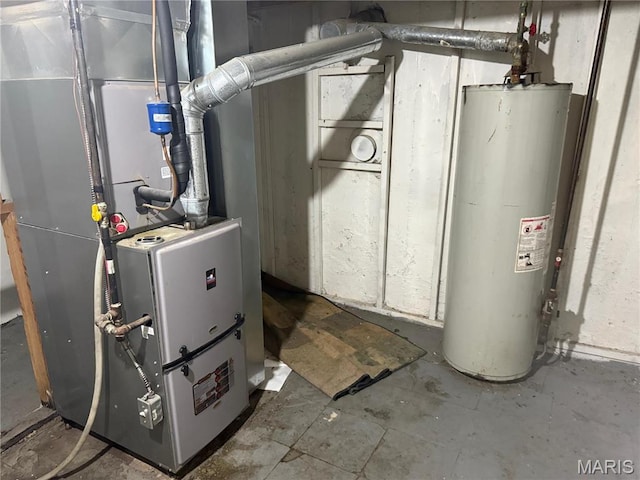 820 Elias Ave, Saint Louis, MO 63147 - utility room featuring water heater and heating unit