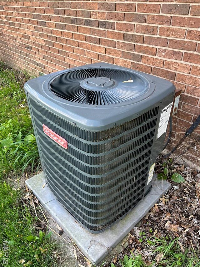 1235 S Hackman St, Staunton, IL 62088 - exterior view of cooling unit and brick siding