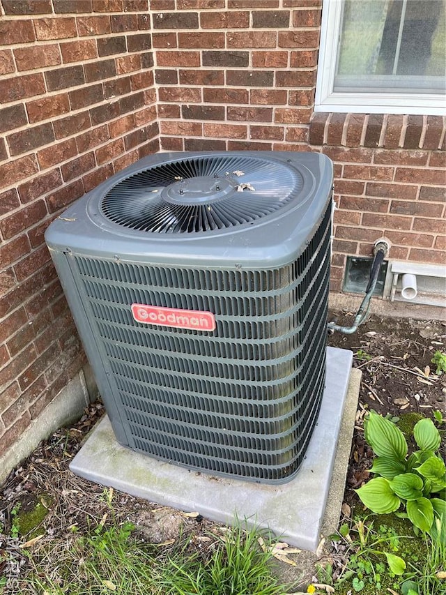 1235 S Hackman St, Staunton, IL 62088 - exterior view of central AC unit and brick siding