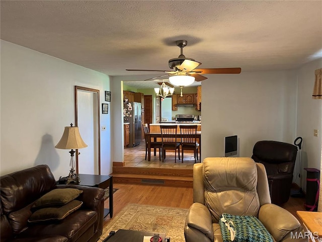 1235 S Hackman St, Staunton, IL 62088 - living area with ceiling fan and light wood-type flooring