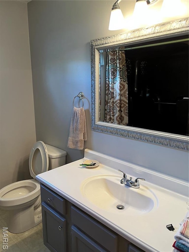 1235 S Hackman St, Staunton, IL 62088 - bathroom featuring toilet and vanity