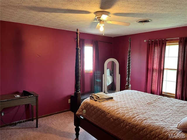 1235 S Hackman St, Staunton, IL 62088 - bedroom featuring carpet flooring, ceiling fan, baseboards, and a textured ceiling