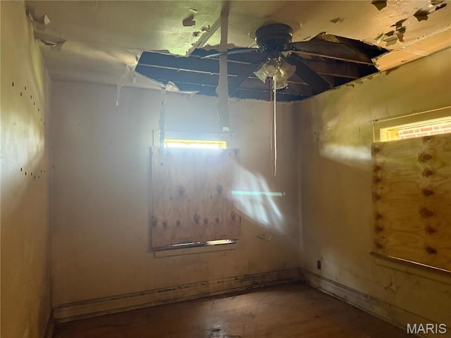 5723 Labadie Ave, Saint Louis, MO 63120 - empty room with ceiling fan, wood finished floors, and baseboards