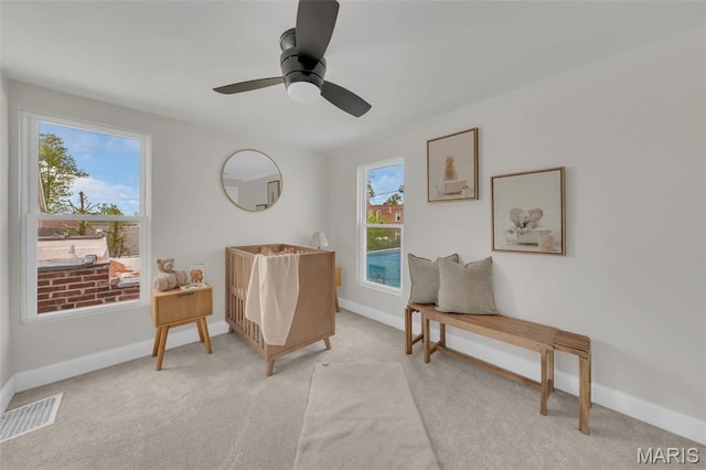 6815 Wise Ave, Saint Louis, MO 63139 - living area featuring light colored carpet and baseboards
