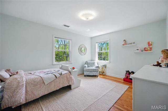 24 Rio Vista Dr, Saint Louis, MO 63124 - bedroom with light wood finished floors and baseboards